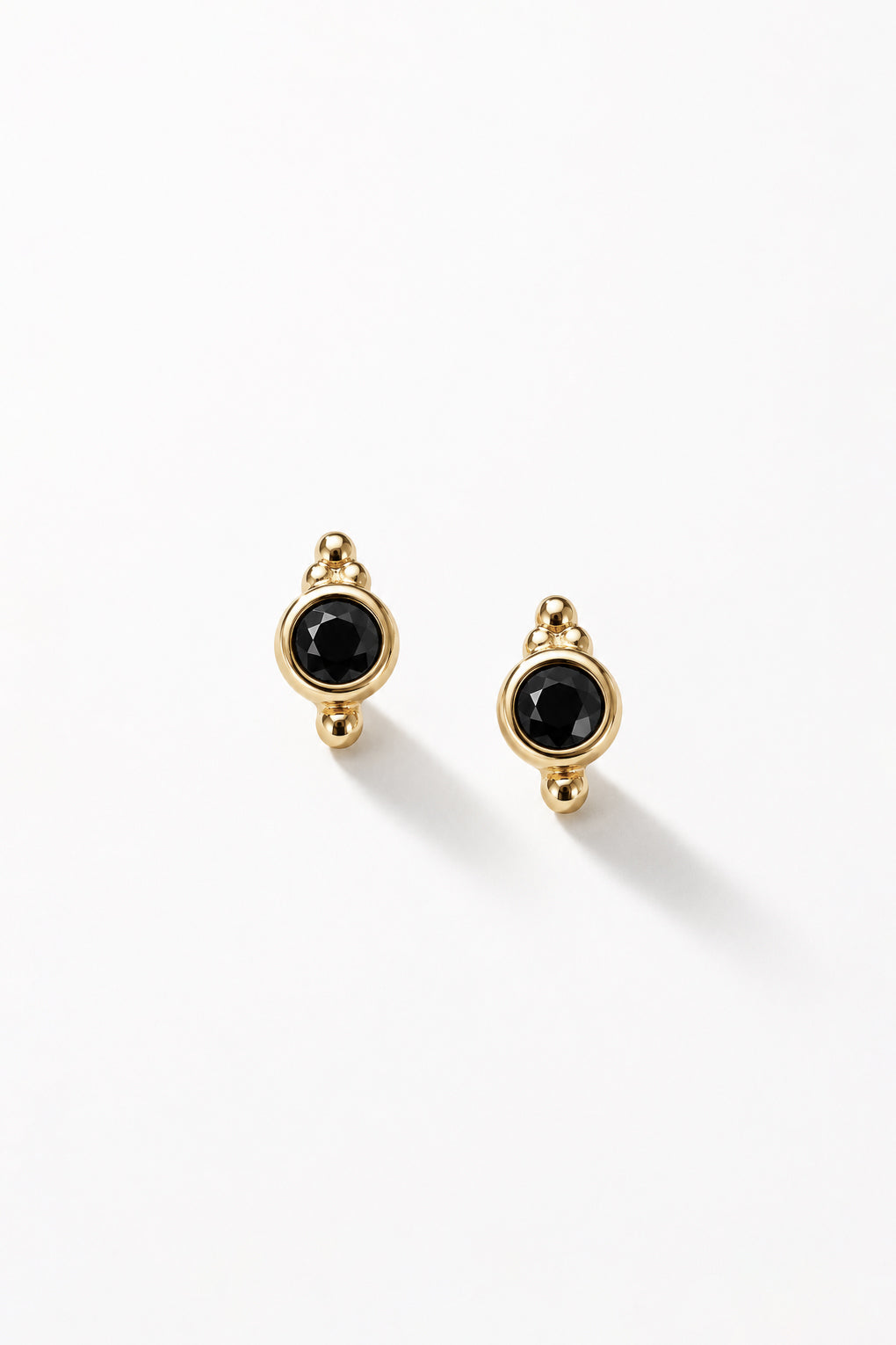 Uno post earrings in 14K gold
