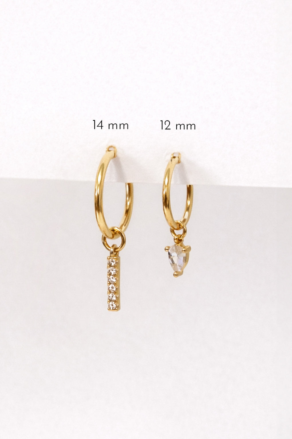 Hoop earrings with replaceable pendants