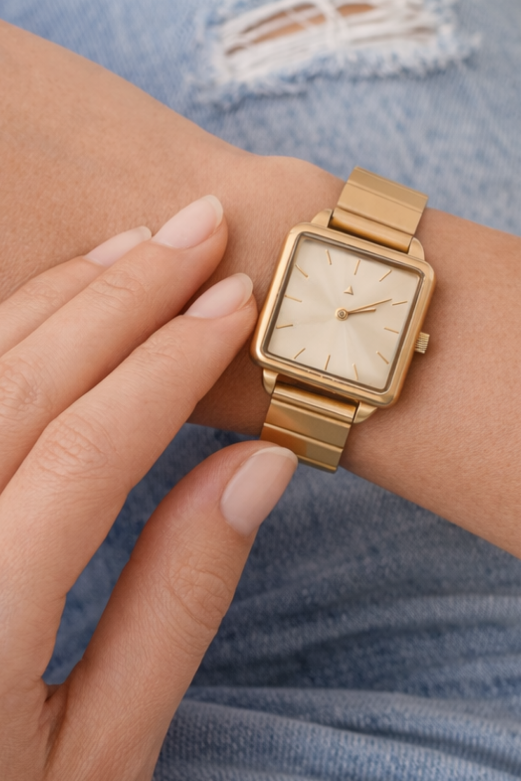Rectangle watch with a golden strap