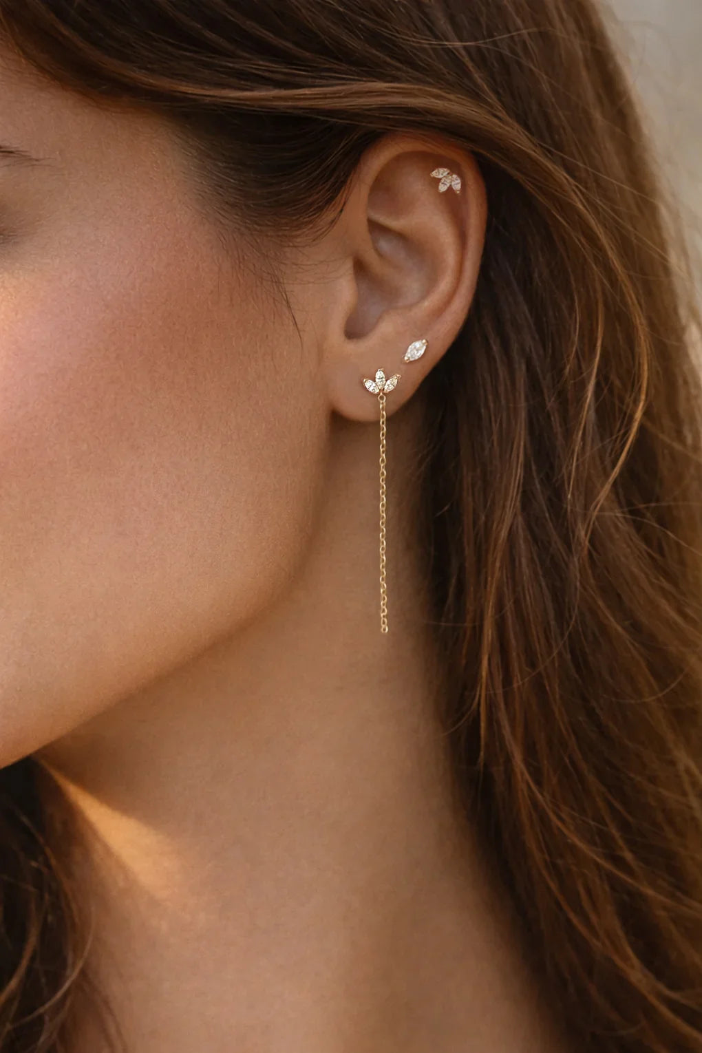 Lotus piercing earring in 14K gold