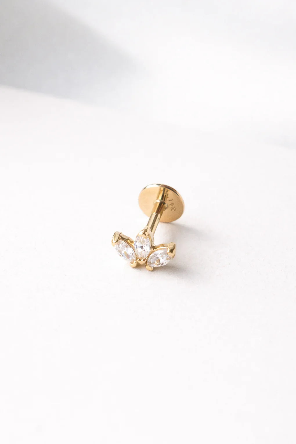 Lotus piercing earring in 14K gold