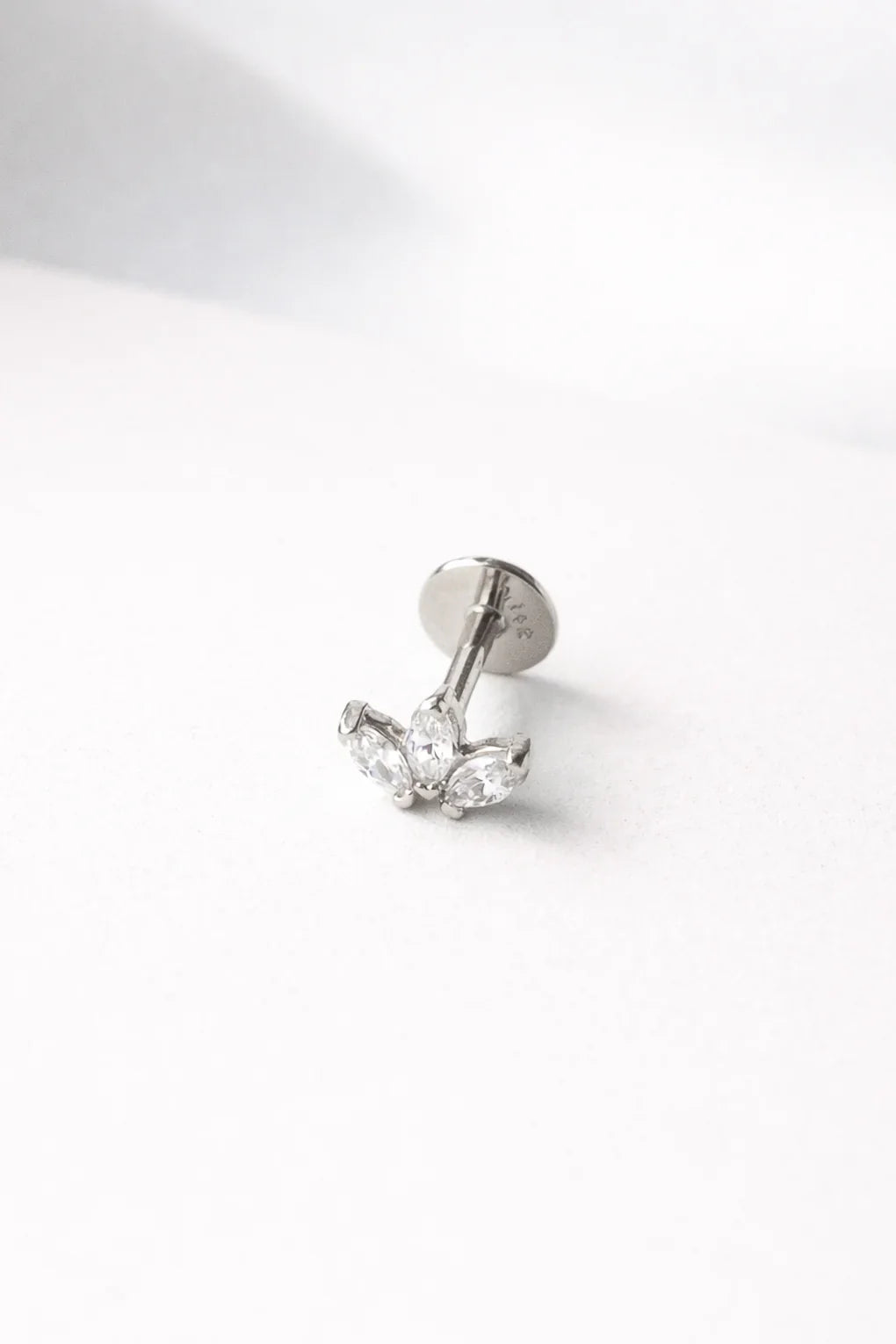 Lotus piercing earring in 14K gold