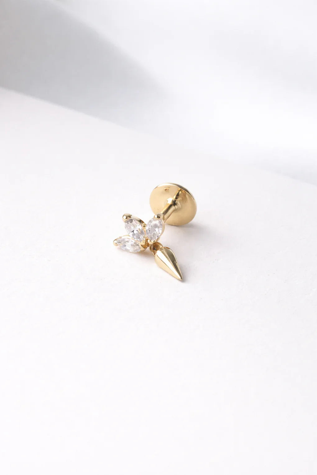 Eddy piercing earring in 14K gold