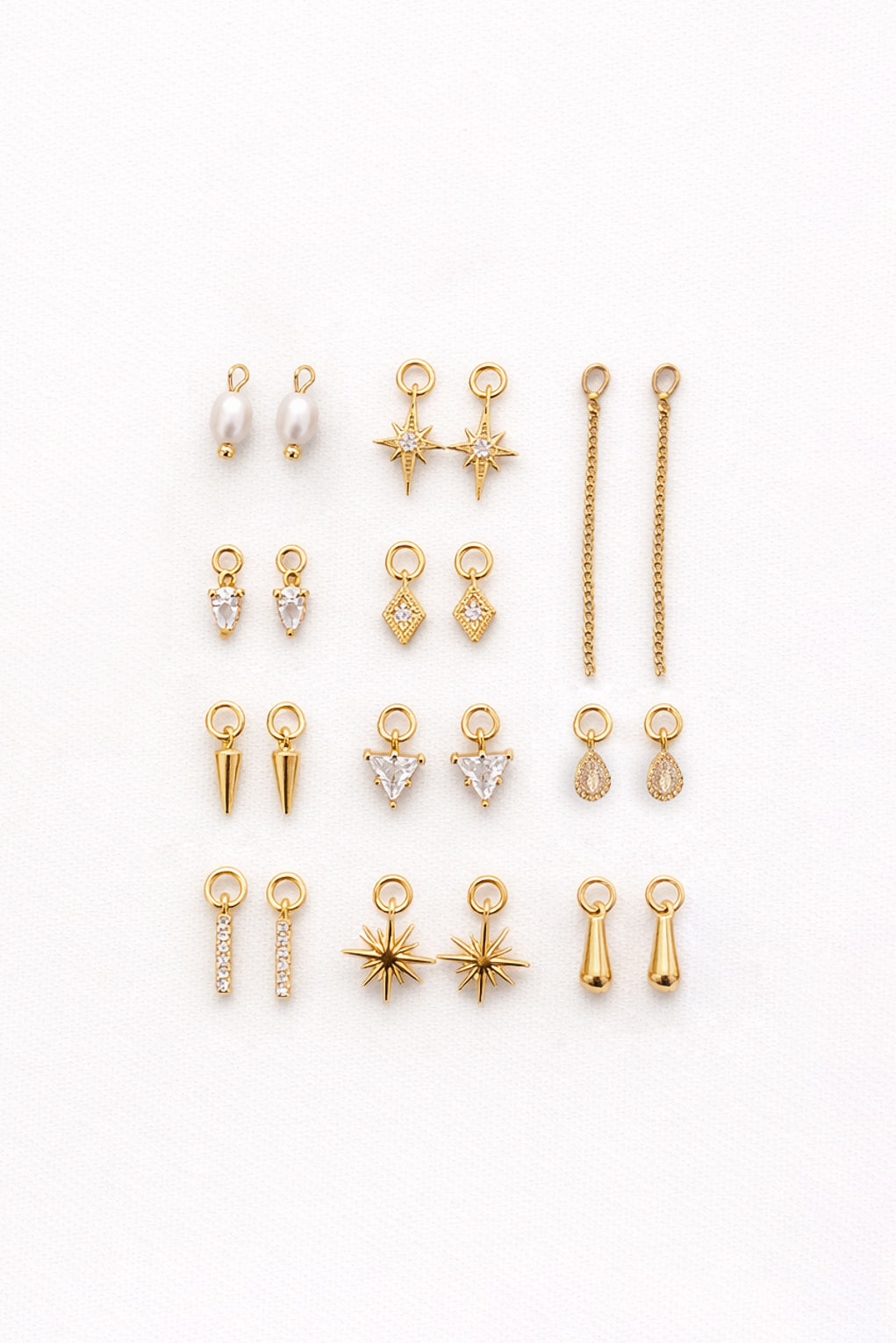 Hoop earrings with replaceable pendants